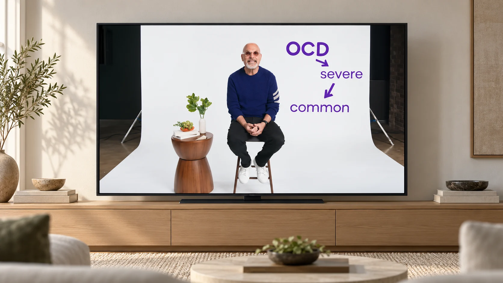Illustrative living-room setting for Howie Mandel’s television ad