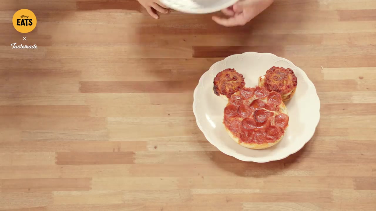 The finished Mickey Mouse-shaped pizza
